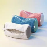 Les trois coloris du sac de lavage Kickow : blanc, bleu et rose